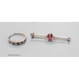 An early 20th century, yellow metal, pink tourmaline and four stone diamond set bar brooch, 47mm,