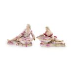 A pair of 19th century Meissen figural sweetmeat dishes