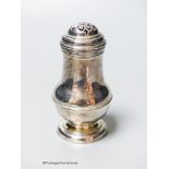 A George I Britannia standard silver bun topped baluster pepper, by George Greenhill Jones, London,