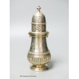 A George V silver baluster sugar caster, Thomas Bradbury & Sons, Sheffield, 1919, 21.3cm, 10oz.