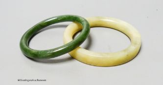 Two hardstone bangles.