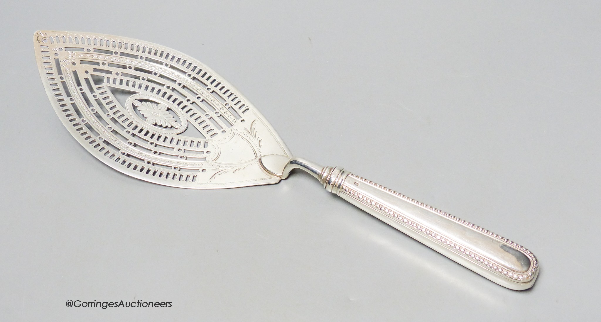 A large George IV silver fish slice, William Abdy I, London, 1784, 30.2cm, loaded handle, gross 4.