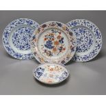 A pair of 18th century Chinese blue and white plates, together with two Chinese Imari dishes, all