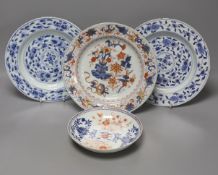 A pair of 18th century Chinese blue and white plates, together with two Chinese Imari dishes, all