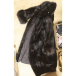 A black seal fur coat