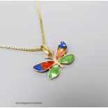 A three colour enamelled butterfly pendant, 23mm (enamel a.f.), on an Italian 750 yellow metal