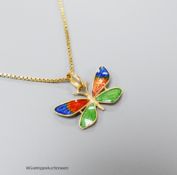 A three colour enamelled butterfly pendant, 23mm (enamel a.f.), on an Italian 750 yellow metal