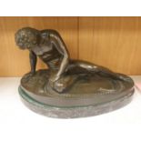 After the Antique, a large bronze figure of 'The Dying Gaul', on a marble plinth, length 55cm