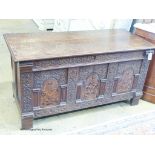 An 18th century marquetry inlaid oak coffer, width 130cm, depth 56cm, height 68cm