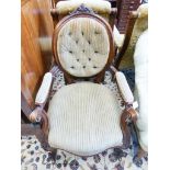 A Victorian oval back chair, on cabriole legs