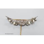 A Victorian yellow metal, diamond and seed pearl set demi-lune brooch, 55mm, gross 6.3 grams.