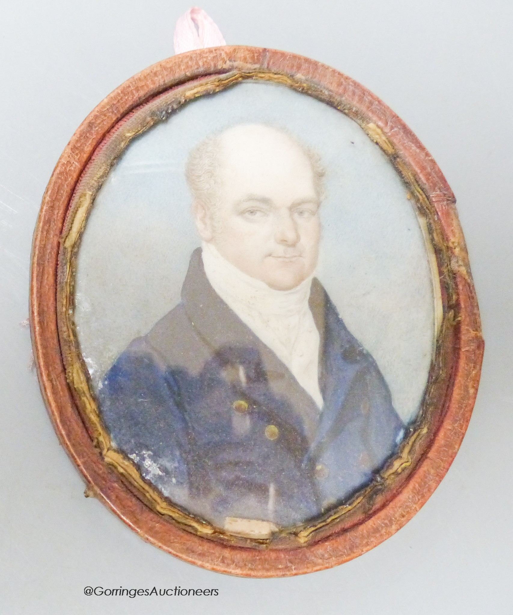 A 19th century portrait miniature, Study of a gentleman in black jacket with white shirt
