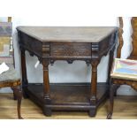 A 17th century carved oak credence type table (faults), width 104cm, depth 46cm, height 81cm