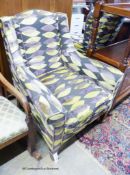 An Edwardian armchair in Sanderson fabric, width 76cm, depth 84cm, height 90cm