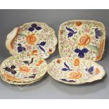 A Coalport porcelain part dessert service, circa 1820, painted with stylised flowers comprising two
