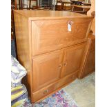 An Ercol elm Windsor fall front writing cabinet, width 82cm, depth 44cm, height 110cm