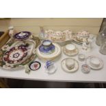 A collection of decorative ceramics to include cabinet cups and saucers, a delft casket, vases,