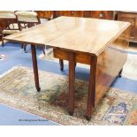 A George III mahogany drop leaf dining table. 151cm extended, D-120, H-75cm