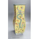 A Chinese yellow ground 'dragon' square baluster vase, 43.5cm high