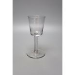A mid 18th century glass wine goblet, bucket bowl, height 21cm