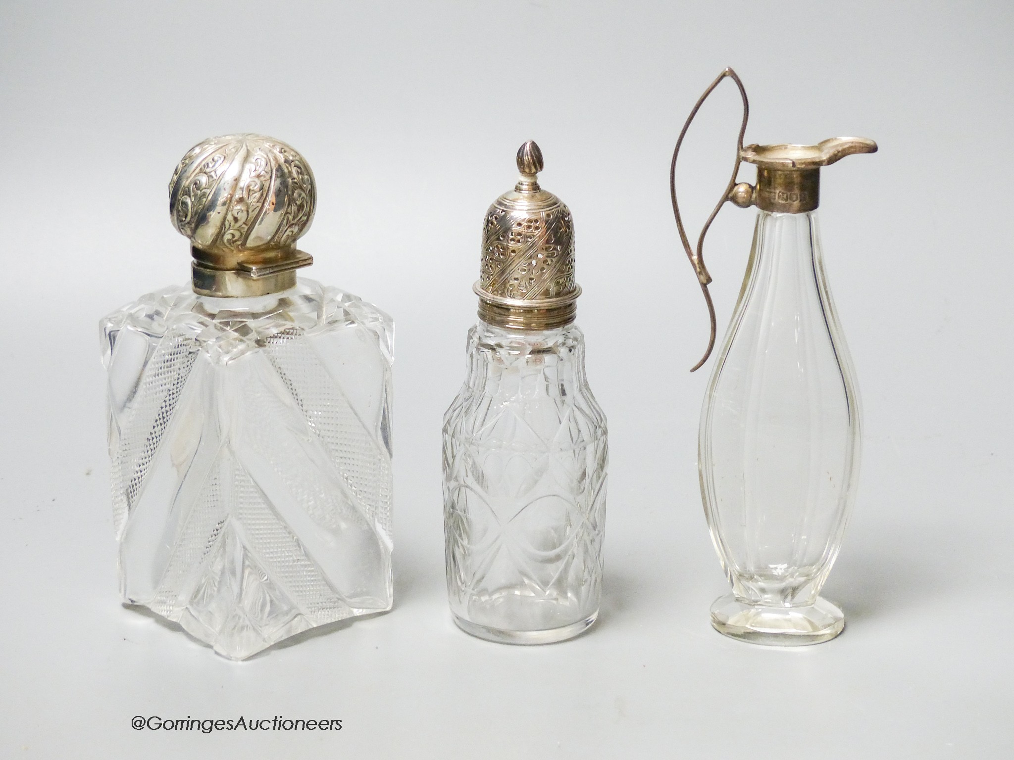 A late Victorian silver topped cut glass scent bottle, London, 1890, 15cm, a later silver mounted - Image 2 of 3