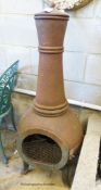 A cast iron chiminea, H.122cm