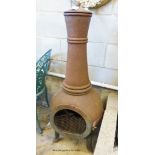 A cast iron chiminea, H.122cm