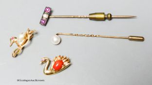 A modern 14k, baroque pearl and gem set duck brooch, 22mm and a similar coral set swan brooch,