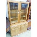 An Ercol elm Windsor glazed display cabinet, width 91cm, depth 43cm, height 152cm
