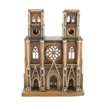 A 19th-century French walnut and ivory model of Notre Dame Cathedralwith carved and pierced windows