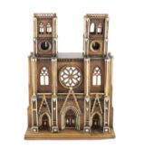 A 19th-century French walnut and ivory model of Notre Dame Cathedralwith carved and pierced windows