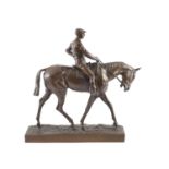 Emanuel Fremiet (1824-1910), a bronze model of a horse and jockey,signed in the naturalistic