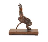 A Chinese scholar's rootwood carving of a deer, 18th century,with rich chestnut brown patina,25cm