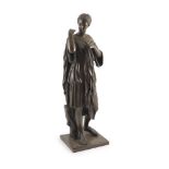 A large 19th century bronze figure of a classical maidenstanding, adjusting her toga, Reproduction