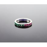 A platinum? ruby, emerald and sapphire set full eternity ring,size M, gross weight 1.6 grams.