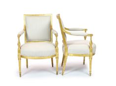 A pair of Louis XVI style giltwood elbow chairswith moulded show wood frames, upholstered arms