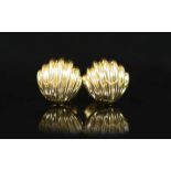A modern pair of Tiffany & Co 18ct gold cufflinks,of fluted shell form, 27.4 grams.