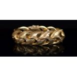 A 1970's brushed 18ct gold bracelet, 18.5cm, 57.3 grams.