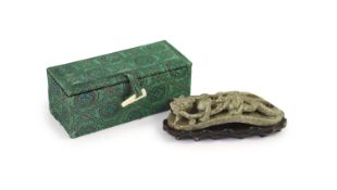 A Chinese ‘chicken bone’ jade carving, 17th/18th centurycarved in high relief and open work with a