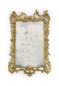 A George III carved giltwood wall mirror,with original rectangular plate and flower, fruit and