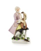 A Meissen figure of a lute player, c.1755on a flower encrusted base, underglaze blue crossed swords