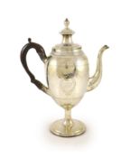 A George III provincial silver pedestal coffee pot with hinged cover, by John Robertson I,of ovoid