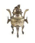 An early 20th century Chinese Export silver two handled koro and cover,with stag head handles and