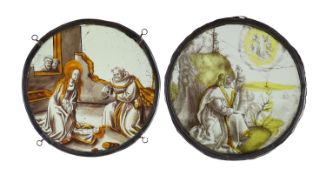 Two 16th century Netherlandish stained glass roundels, ‘’The Nativity’’ and ‘’St. John on Patmos,23