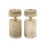 A pair of textured silver salt and pepper mills by Adrian Gerald Benney,of cylindrical form,