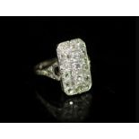A 1930's/1940's white gold? and diamond cluster tablet ring,set with graduated old mine cut stones