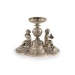 A Victorian silver centrepiece (lacking trumpet),with engraved and embossed foliate decoration and