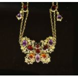 A 19th century gold and multi gem set twin strand necklace, with pendant modelled as a butterfly,