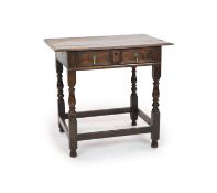 A William and Mary rectangular oak side tablewith panelled freezer drawer and banister legs with