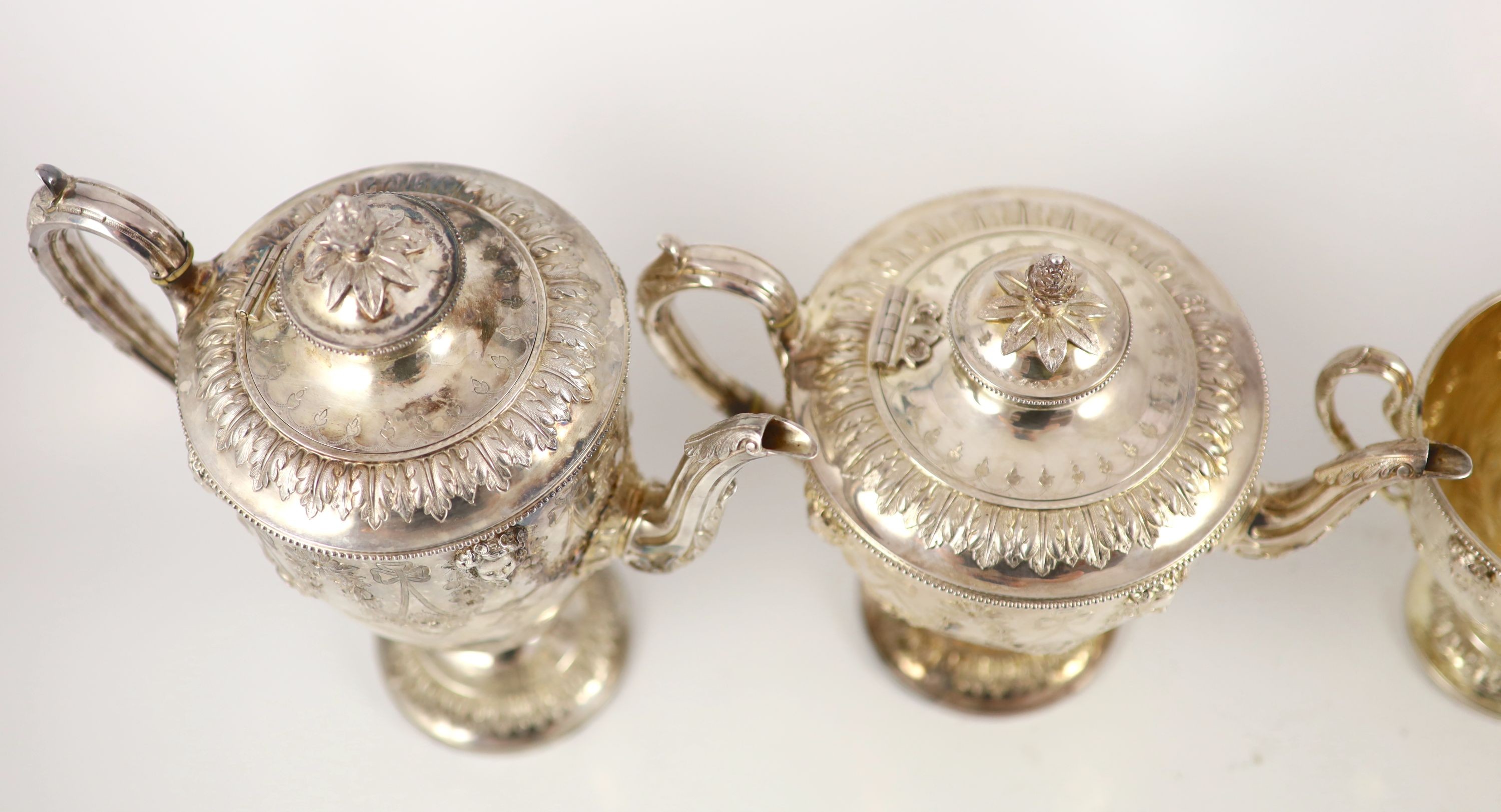 A Victorian embossed silver four-piece tea and coffee service of classical vase form, London 1886, - Image 3 of 6